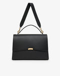 A black leather top-handle handbag with a wide shoulder strap, gold-tone hardware, and a small gold clasp on the front flap, shown against a plain white background.