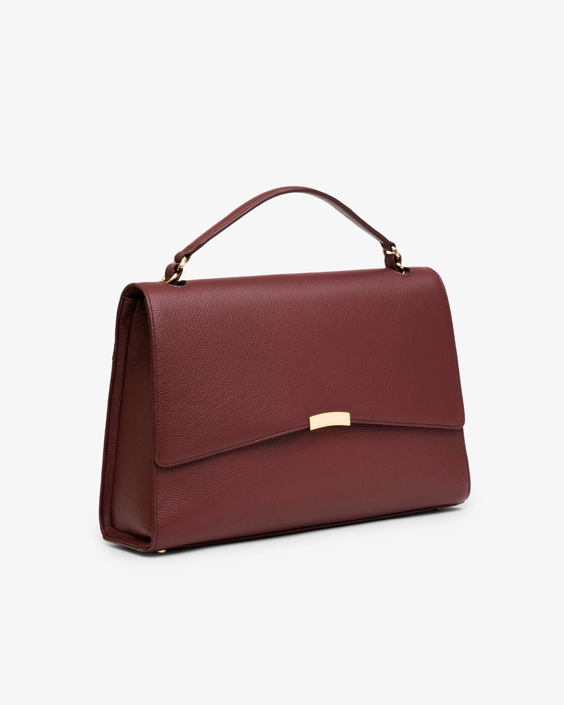 A burgundy pebbled leather handbag with a top handle and a small gold-tone metal accent on the front flap, shown against a plain white background.
