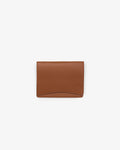 A tan leather passport holder, shown against a white background. 