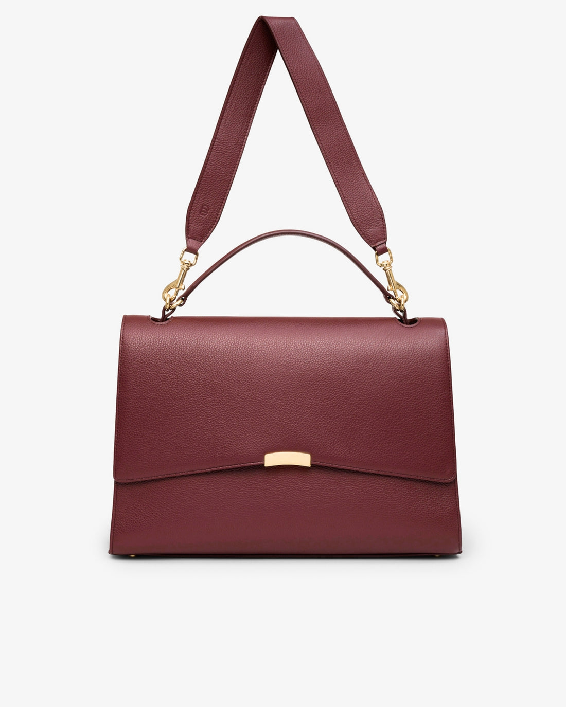 A structured burgundy leather handbag with a top handle, an adjustable shoulder strap, and gold-tone hardware, shown against a plain light gray background.