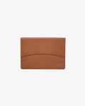 A tan leather laptop cover with a curved center seam, shown flat against a light gray background.