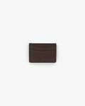 A dark brown textured leather card holder with two horizontal card slots, centered on a light gray background.