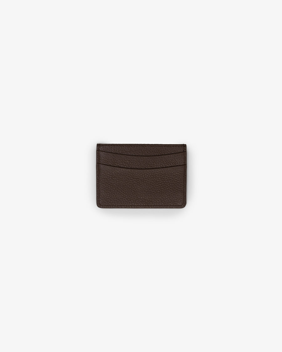 A dark brown textured leather card holder with two horizontal card slots, centered on a light gray background.
