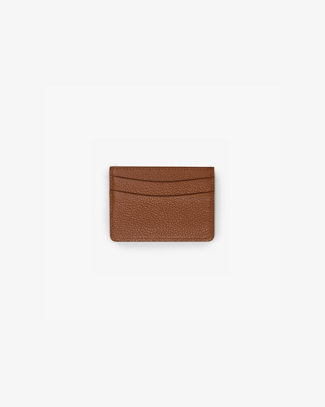 A tan leather card holder, with two horizontal pockets, shown against a white background.