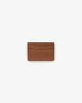 A small brown textured leather card holder wallet with curved card slots, centered on a plain white background.