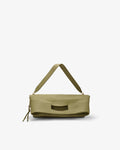 An olive green leather shoulder bag with a wide top handle, a zippered front pocket, and a small tassel zipper pull, shown on a plain light gray background.