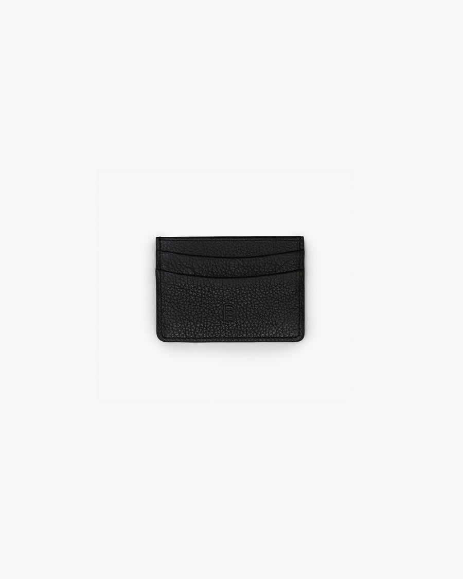 A black textured leather card holder with a subtle pebbled grain finish and an embossed "B" logo, shown from the front on a clean, light gray background.