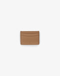 A slim tan leather card holder wallet with curved card slots and a debossed 