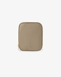 A small rectangular zippered pouch in taupe brown pebbled leather with a gold zipper pull and a subtle embossed logo, shown on a plain white background.