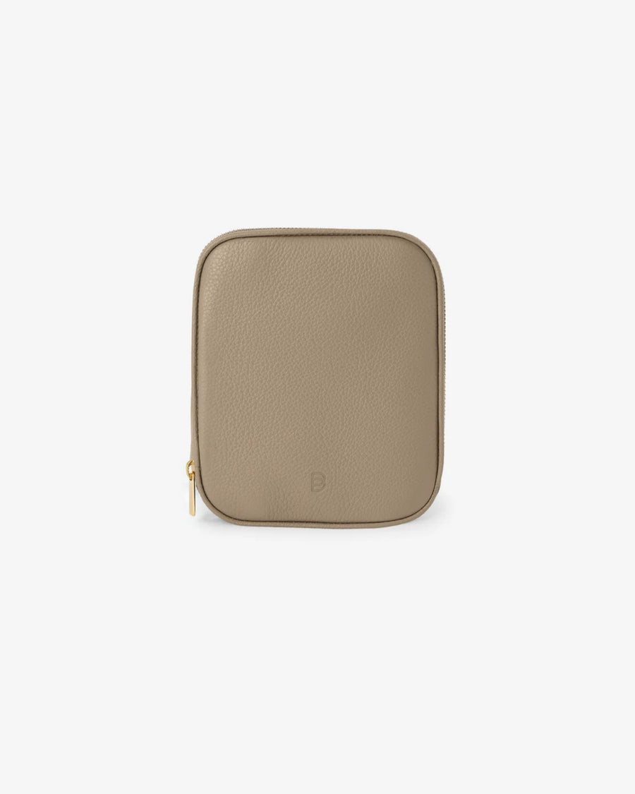 A small rectangular zippered pouch in taupe brown pebbled leather with a gold zipper pull and a subtle embossed logo, shown on a plain white background.