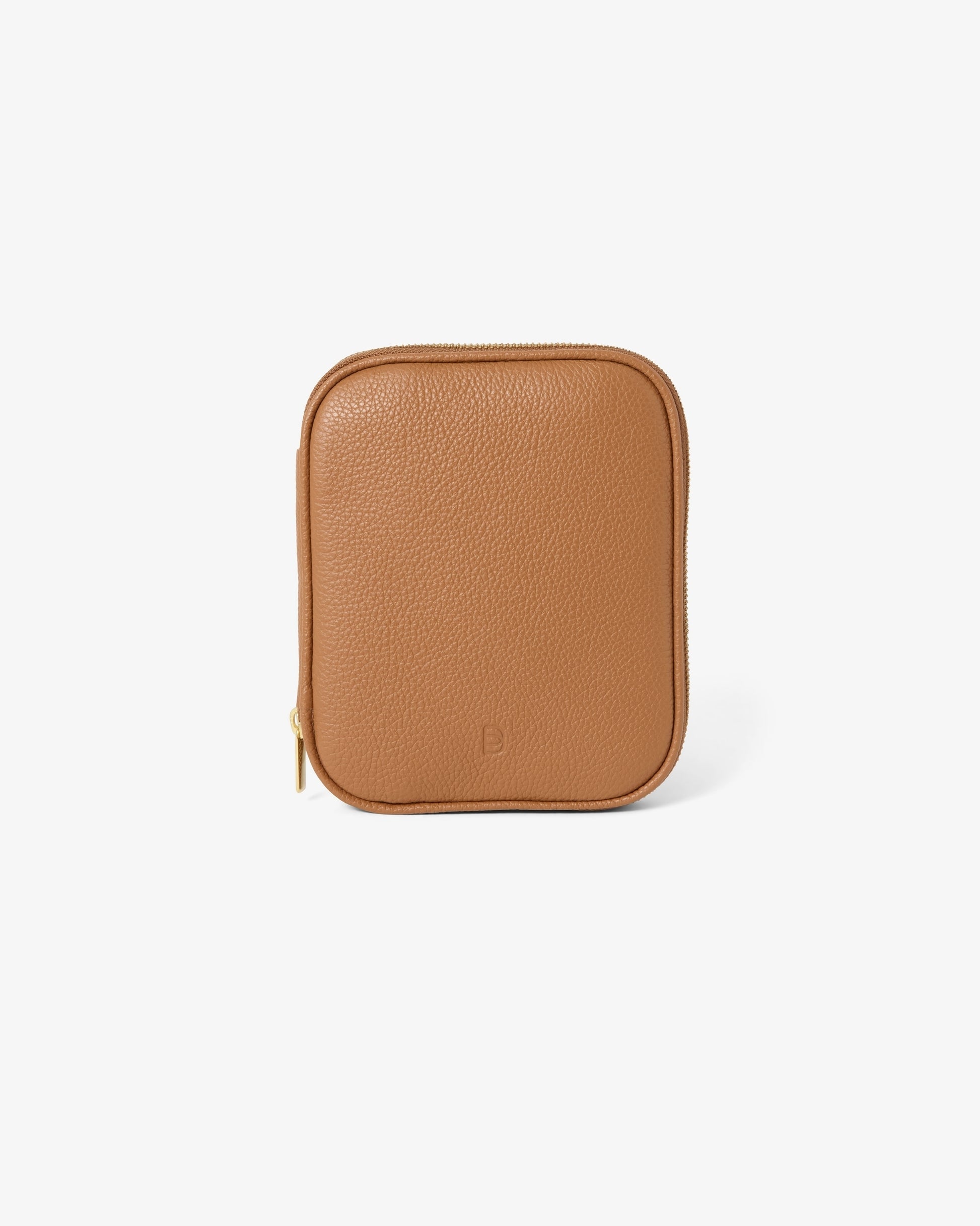 A small tan pebbled leather zippered pouch with rounded corners and a subtle embossed 'B' logo on the front, shown on a clean white background.