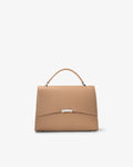 A structured top-handle handbag in tan leather with a silver-tone metal accent on the front flap, shown against a plain white background.