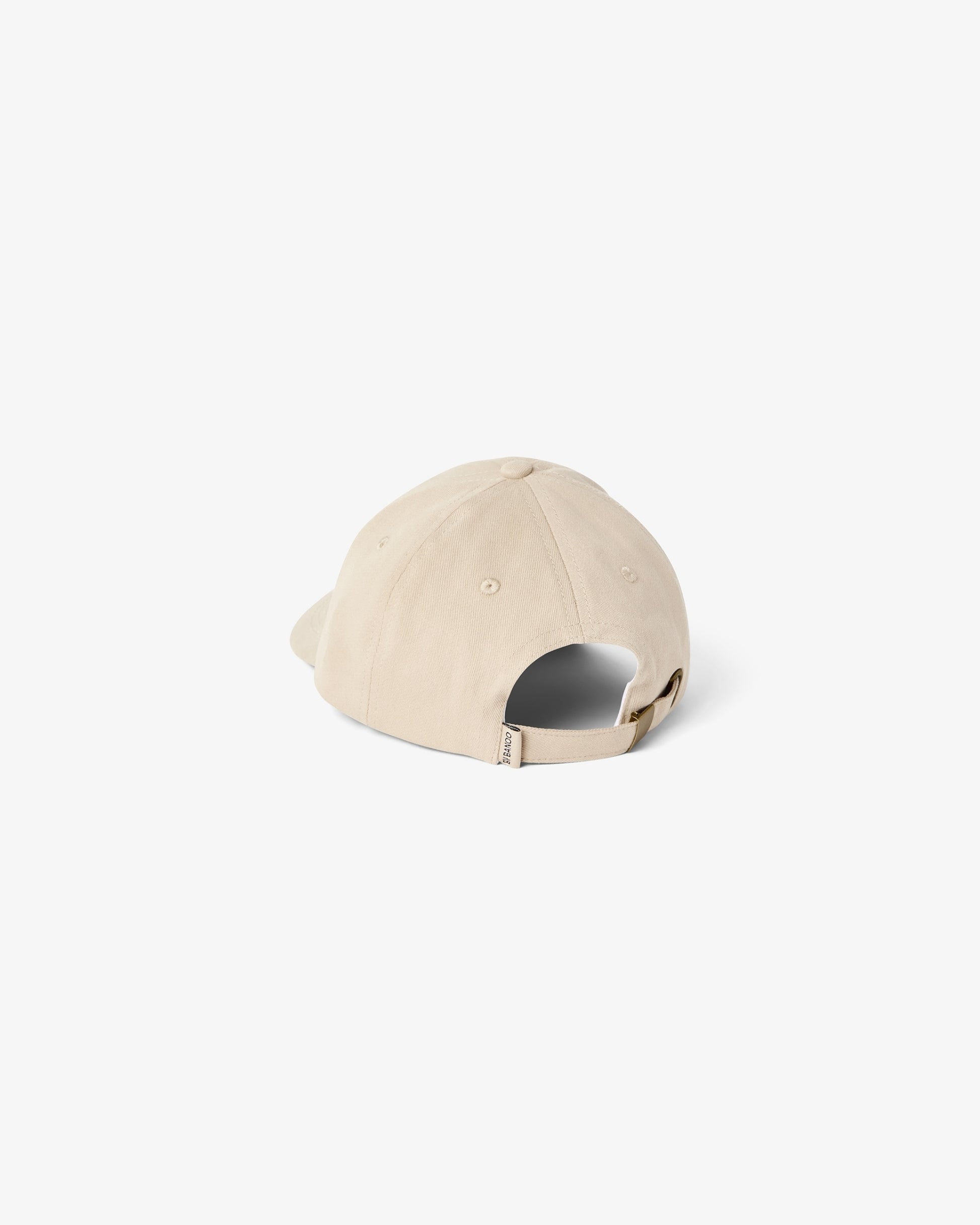 A light beige baseball cap shown from a rear three-quarter angle on a clean, solid off-white background.