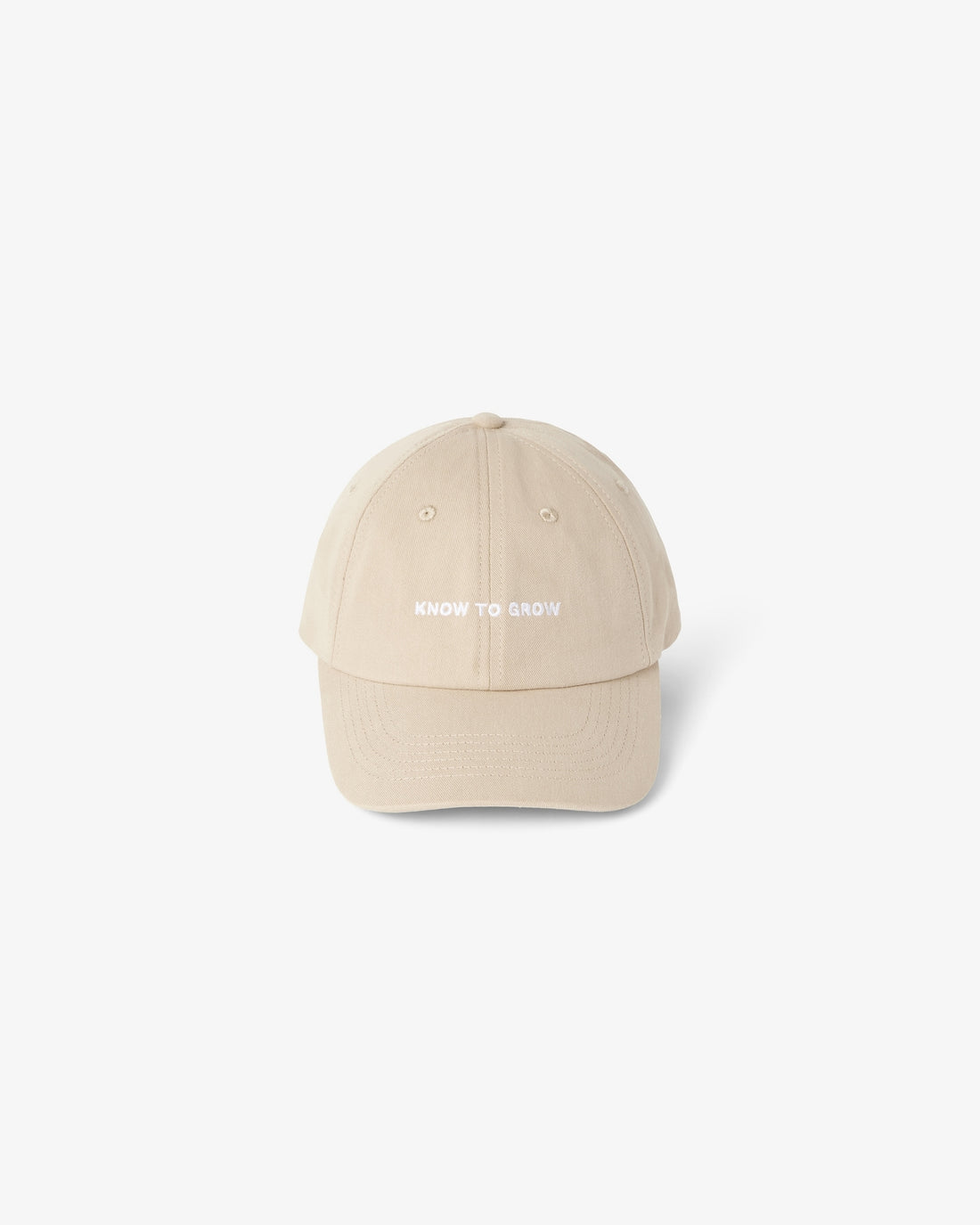 A light beige baseball cap with the words 'KNOW TO GROW' embroidered in white on the front, centered against a plain white background.