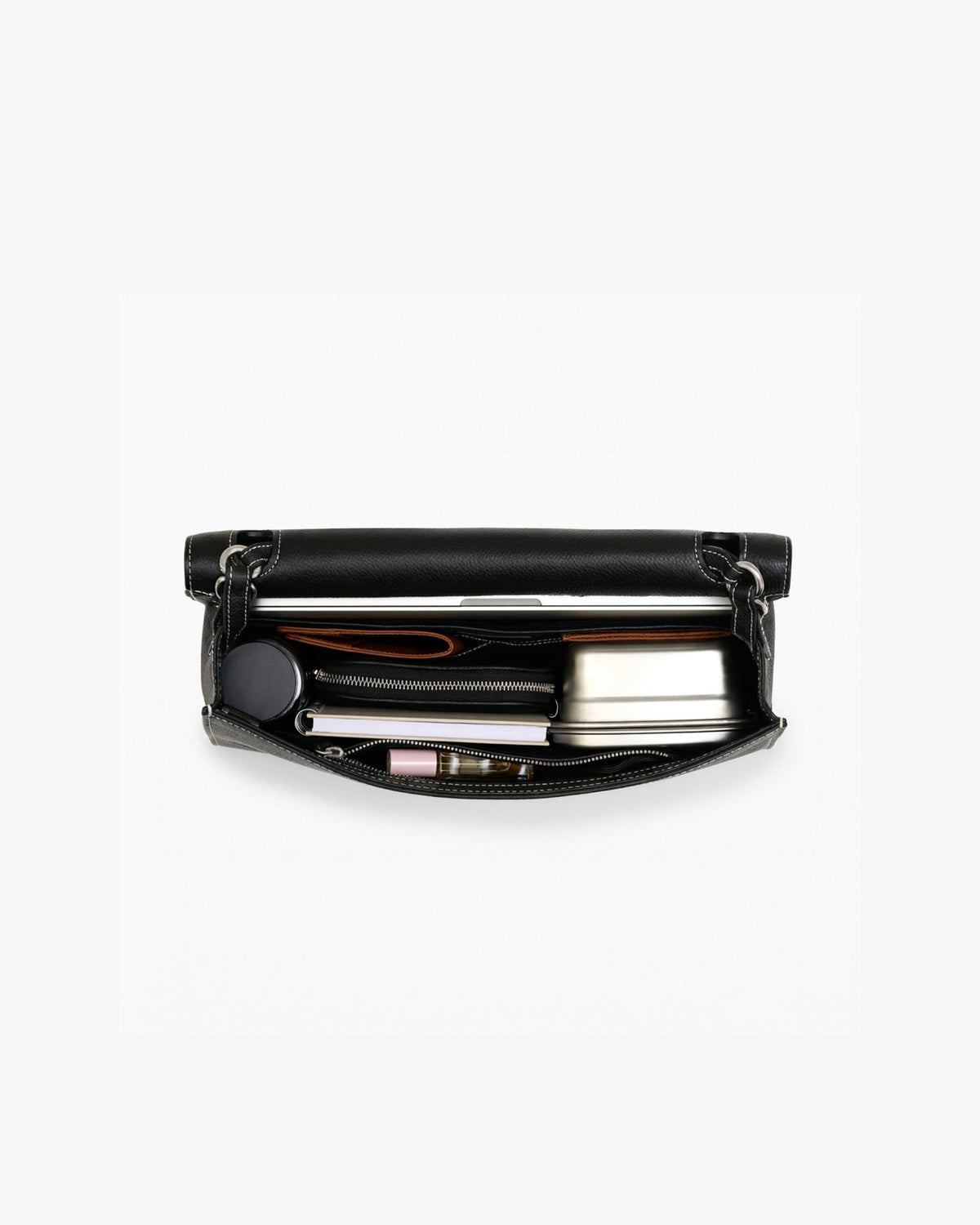 An open leather briefcase in black with white contrast stitching, showcasing items inside the bag. 