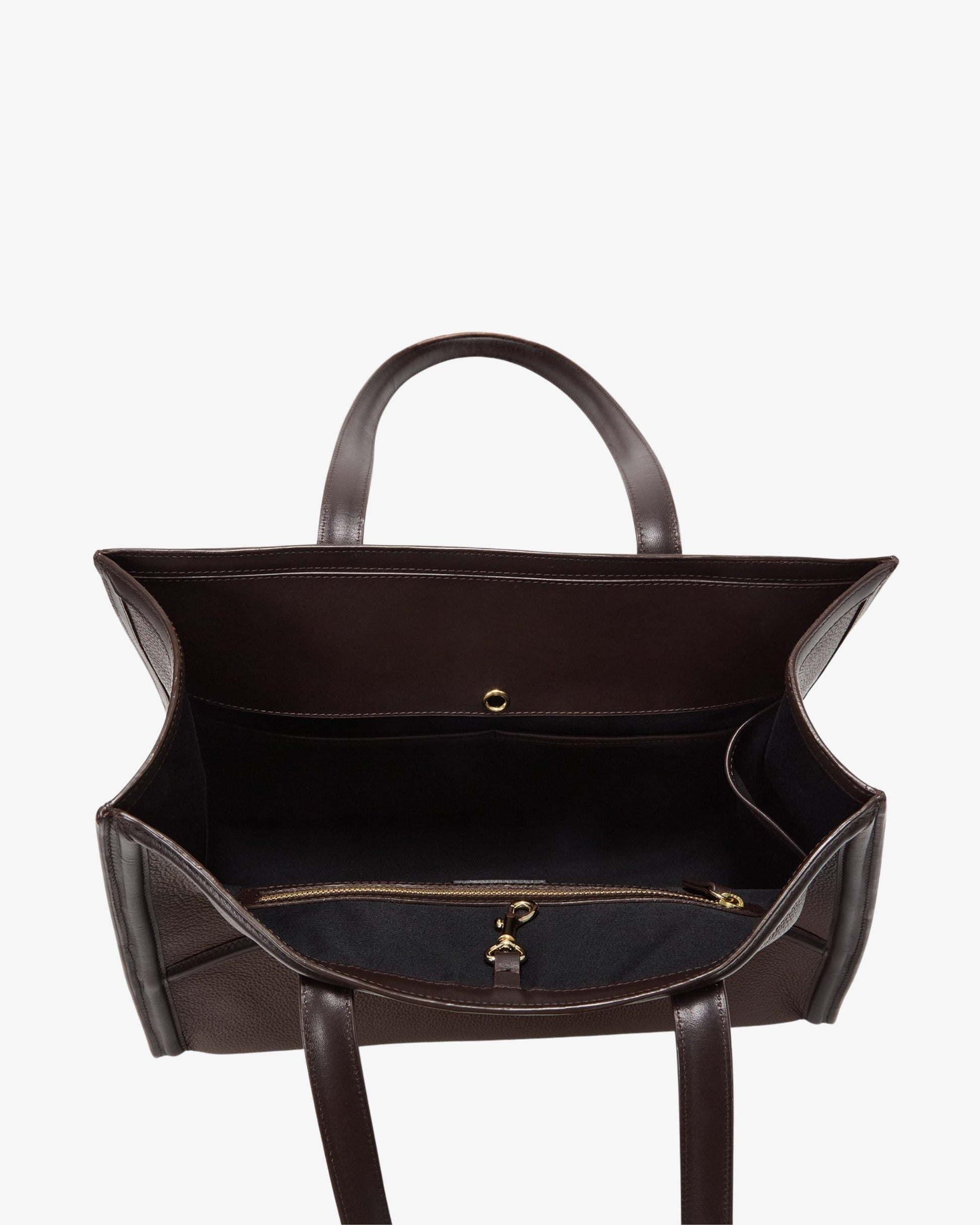 A dark brown leather tote bag shown from a top-down view, highlighting its spacious interior, dual top handles, and a zippered compartment with gold-tone hardware.