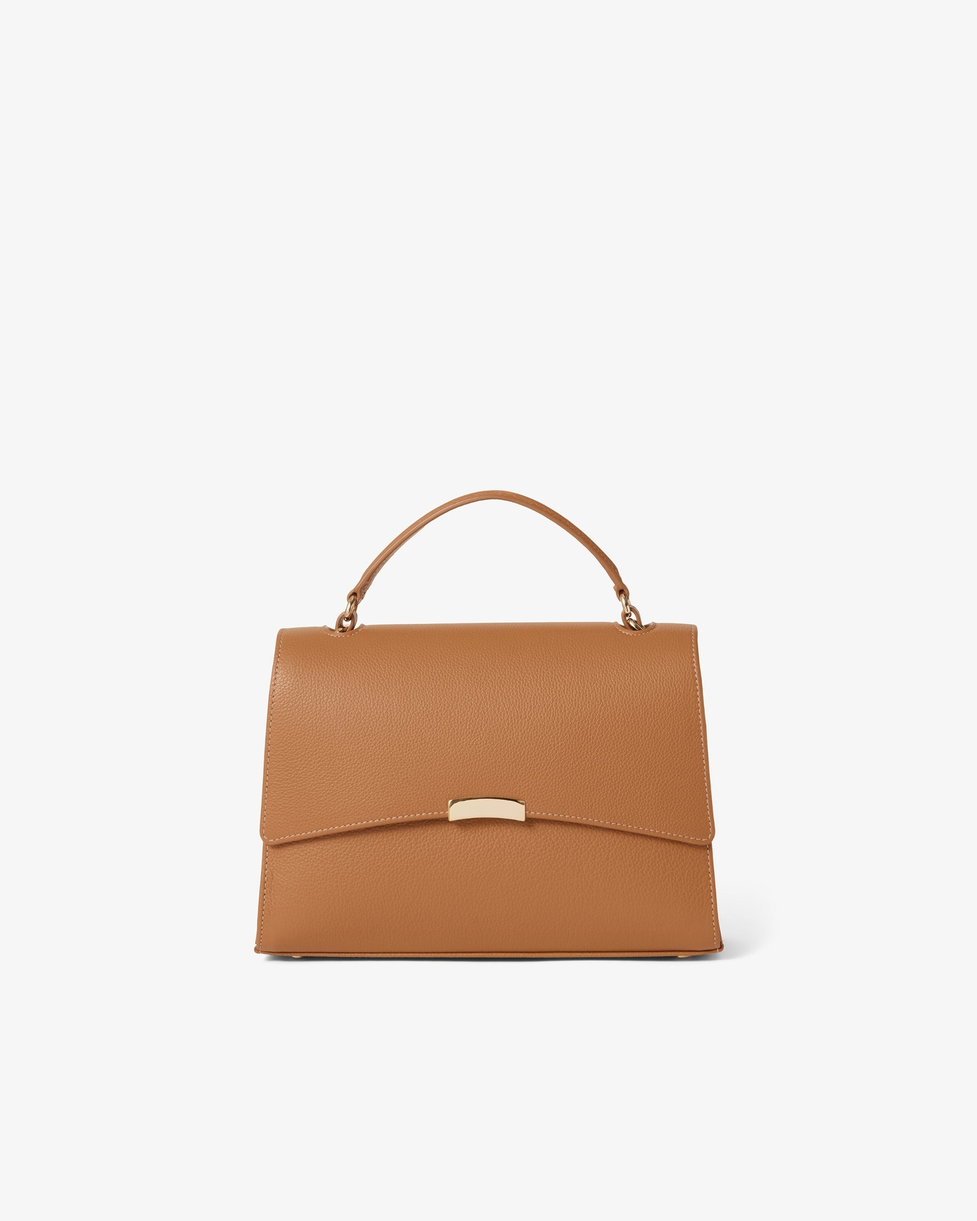A structured tan leather handbag with a top handle and a gold-tone metal clasp on the front flap, photographed against a clean white background.