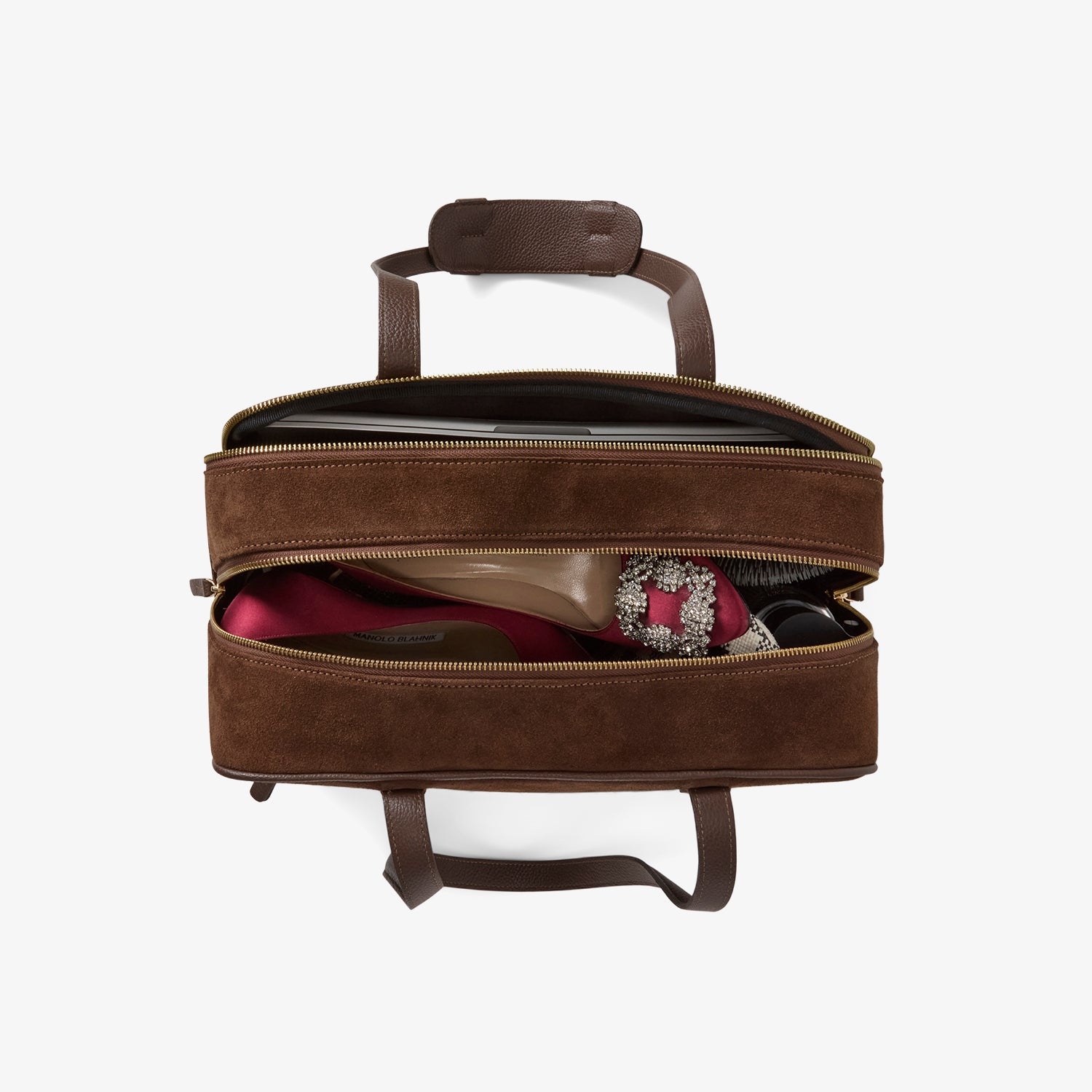 Top view of the 12 hour duffel bag in mocha/gold packed with laptop and red heels – spacious and organized design for the modern woman on the move.