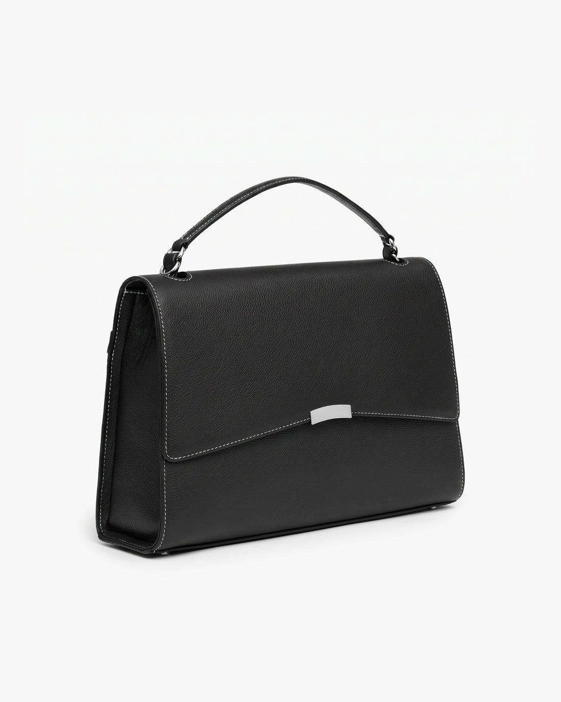 A black leather top-handle handbag with a silver-tone metal accent on the front flap and contrast stitched seams, shown from a three-quarters angle against a plain white background.